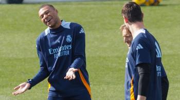 Los jugadores del Real Madrid Kilian Mbappé, Luka Modric y Thibaut Courtois, durante un entrenamiento.