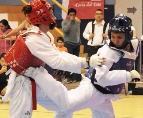 Imagen de una competencia de taekwondo.