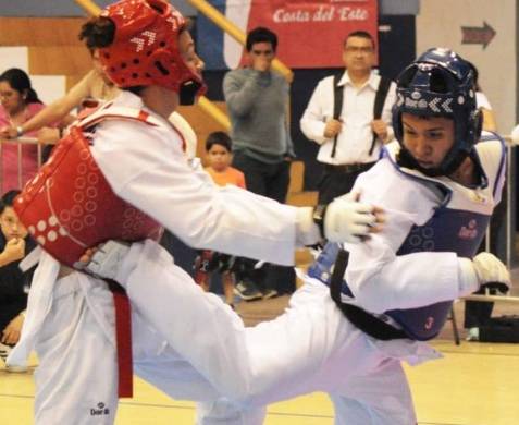 Imagen de una competencia de taekwondo.