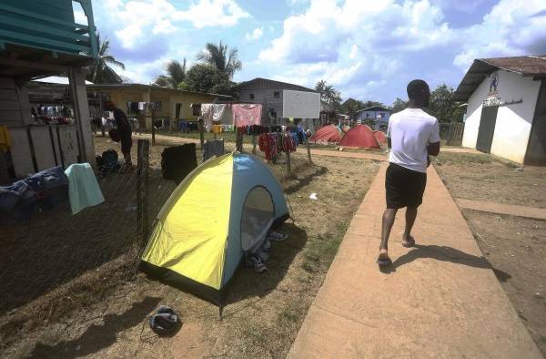 Migrantes persiguen sus sueños en medio de la mortífera pandemia de la covid-19