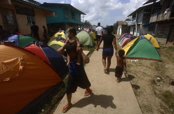 Migrantes persiguen sus sueños en medio de la mortífera pandemia de la covid-19