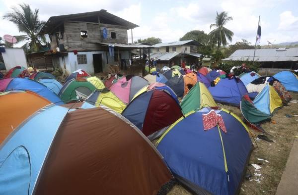 Migrantes persiguen sus sueños en medio de la mortífera pandemia de la covid-19