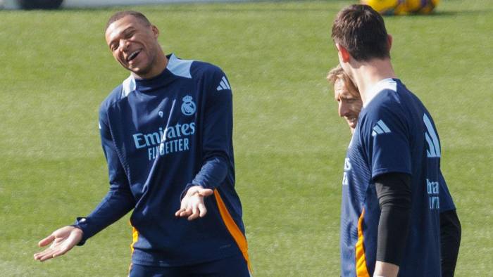 Los jugadores del Real Madrid Kilian Mbappé, Luka Modric y Thibaut Courtois, durante un entrenamiento.