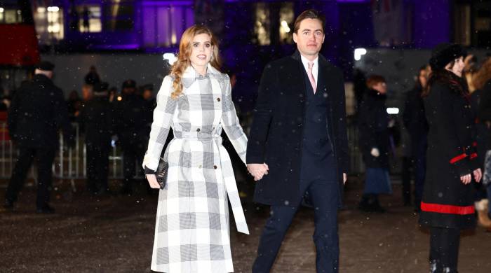 La princesa Beatriz de York de Gran Bretaña y su esposo Edoardo Mapelli Mozzi asisten al “Servicio de villancicos juntos en Navidad” en la Abadía de Westminster, en Londres, el 15 de diciembre de 2022.